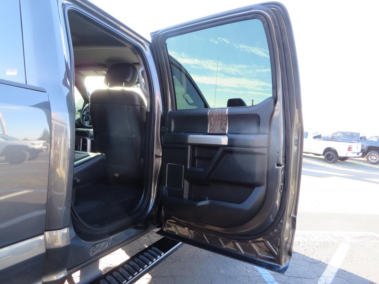 2019 CHARCOAL /BLACK Ford F-350 SD Lariat Crew Cab 4WD (1FT8W3BT7KE) with an 6.7L V8 OHV 16V DIESEL engine, 6A transmission, located at 2630 Grass Valley Highway, Auburn, CA, 95603, (530) 508-5100, 38.937893, -121.095482 - Leveled Superduty sitting on 20" XD series wheels, 35" Nitto Ridge Grappler tires, window tint, and has Firestone Air bags. - Photo#49